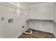 Laundry room featuring shelving, countertop and wood-look flooring at 16271 Ambia Cir, Westfield, IN 46074