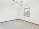 Cozy bedroom with fan and window at 1652 Valley Brook Dr, Indianapolis, IN 46229
