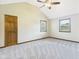 Empty bedroom with two windows and ceiling fan at 1652 Valley Brook Dr, Indianapolis, IN 46229