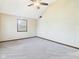 Empty bedroom with a ceiling fan and a window at 1652 Valley Brook Dr, Indianapolis, IN 46229