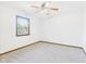 Clean bedroom with ceiling fan and window at 1652 Valley Brook Dr, Indianapolis, IN 46229