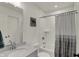 Bathroom featuring a sink with quartz countertop, toilet, bathtub, and turtle art at 16683 Alex Dr, Noblesville, IN 46060