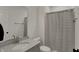 Bright bathroom with a gray vanity, modern fixtures, and a shower with a striped curtain at 16683 Alex Dr, Noblesville, IN 46060