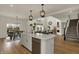 Gourmet kitchen with large island, stainless steel appliances, and open layout at 16683 Alex Dr, Noblesville, IN 46060