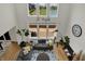 Bright living room features high ceilings, large windows, and modern decor at 16683 Alex Dr, Noblesville, IN 46060