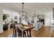Open living space with a modern kitchen, dining area and fireplace at 16683 Alex Dr, Noblesville, IN 46060