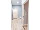 Hallway with built-in bench seating and open doors at 1723 Fletcher Ave, Indianapolis, IN 46203