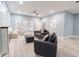 Bright living room with large windows, modern furniture and neutral color palette at 1723 Fletcher Ave, Indianapolis, IN 46203