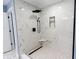 Contemporary bathroom featuring luxurious walk-in shower with black fixtures and tiled walls at 1723 Fletcher Ave, Indianapolis, IN 46203