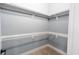 Spacious walk-in closet with ample shelving, perfect for organizing clothes and accessories at 1723 Fletcher Ave, Indianapolis, IN 46203