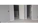 Bedroom featuring three white doors, gray walls, and contemporary design, offering great flow and layout at 17458 Ebling Trl, Westfield, IN 46062
