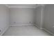 Unfinished room featuring gray walls, white trim, and a clean, modern aesthetic, ready for personalization at 17458 Ebling Trl, Westfield, IN 46062