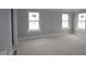 Bright bedroom with two windows is ready for customization and personal touches at 17466 Ebling Trl, Westfield, IN 46062