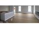 Open-concept living area with large windows and abundant natural light is ready for personal touches at 17466 Ebling Trl, Westfield, IN 46062