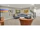 Finished basement featuring a sectional sofa, fun decor, and stairs at 180 Oakhurst Way, Westfield, IN 46074