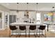 Modern kitchen with a spacious island, stainless steel appliances, and white cabinetry at 180 Oakhurst Way, Westfield, IN 46074