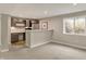 Basement kitchenette featuring stainless steel appliances and wooden cabinets at 180 Oakhurst Way, Westfield, IN 46074