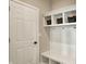 Well-organized mudroom with built-in bench, cubbies, and storage at 180 Oakhurst Way, Westfield, IN 46074