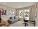 Comfortable office space with a daybed features a large window and modern furnishings at 180 Oakhurst Way, Westfield, IN 46074