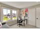Bright office space features large windows with views of the outdoors and modern furnishings at 180 Oakhurst Way, Westfield, IN 46074