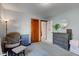Bedroom with gray walls, toddler reading chair, and accent decor at 1865 N Norfolk St, Indianapolis, IN 46224