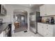 Eat-in kitchen featuring stainless steel appliances and marble tile floors at 1865 N Norfolk St, Indianapolis, IN 46224