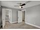 Spacious bedroom with ceiling fan, closet and ensuite bathroom at 207 S Arlington Ave, Indianapolis, IN 46219