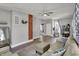 Bright and cozy living room features hardwood floors, fresh paint, and comfortable seating at 207 S Arlington Ave, Indianapolis, IN 46219