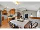 Inviting dining area adjacent to the kitchen, featuring hardwood floors and a view of the living space at 20777 Summitt Rd, Noblesville, IN 46062
