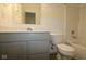 Bathroom featuring a single sink vanity, toilet, and a bathtub with shower at 2276 Marjorie Way, Shelbyville, IN 46176