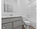 Modern bathroom featuring a gray vanity with solid surface countertops and a shower over tub at 2276 Marjorie Way, Shelbyville, IN 46176