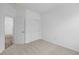 Cozy bedroom features neutral carpet, closet with sliding doors, and adjacent doorway at 2276 Marjorie Way, Shelbyville, IN 46176