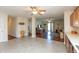 Open-concept kitchen leading to living area offers versatile space for entertaining and everyday living at 2923 Armaugh Dr, Brownsburg, IN 46112