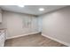 Kitchen area featuring wood-look flooring and neutral walls at 2935 Highland Pl, Indianapolis, IN 46208