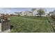 Spacious, well-maintained backyard featuring a lush lawn and black chainlink fence at 3189 Underwood Dr, Whiteland, IN 46184