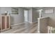 Hallway area with durable floors and neutral colored walls at 3189 Underwood Dr, Whiteland, IN 46184