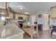 Bright kitchen featuring wood cabinets, granite countertops, stainless steel appliances, and a wood island at 3189 Underwood Dr, Whiteland, IN 46184