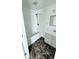 Bright bathroom featuring a shower, modern vanity, and eye catching flooring at 3532 E 10Th St, Indianapolis, IN 46201