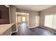 Spacious living room showcasing an open floor plan and hardwood floors at 3532 E 10Th St, Indianapolis, IN 46201