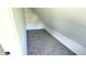 Cozy closet featuring plush carpet and white trim at 3532 E 10Th St, Indianapolis, IN 46201