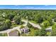 An aerial view of the tree-lined neighborhood street, showcasing the natural beauty at 3611 Owster Ln, Indianapolis, IN 46237