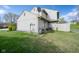 Side view of the house showing the yard, and utilities at 3611 Owster Ln, Indianapolis, IN 46237
