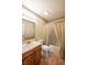 Traditional bathroom with tub-shower, vanity, and neutral finishes at 3611 Owster Ln, Indianapolis, IN 46237