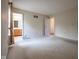 Spacious bedroom with neutral walls, carpet, and ensuite bathroom access at 3611 Owster Ln, Indianapolis, IN 46237