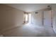 Bright and airy bedroom with soft carpeting and natural light from the window at 3611 Owster Ln, Indianapolis, IN 46237
