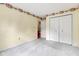 Bedroom featuring a double closet with light-filled views into the house at 3611 Owster Ln, Indianapolis, IN 46237