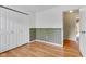 Bedroom features a double closet with light-filled views into the house at 3611 Owster Ln, Indianapolis, IN 46237