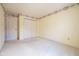 Empty bedroom with wall-to-wall carpet, trim at ceiling, and double closet at 3611 Owster Ln, Indianapolis, IN 46237