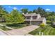 Charming two-story home with mature landscaping, inviting curb appeal, and a two-car garage at 3611 Owster Ln, Indianapolis, IN 46237