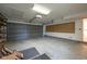 Spacious garage with ample storage potential and pegboard organizer at 3611 Owster Ln, Indianapolis, IN 46237